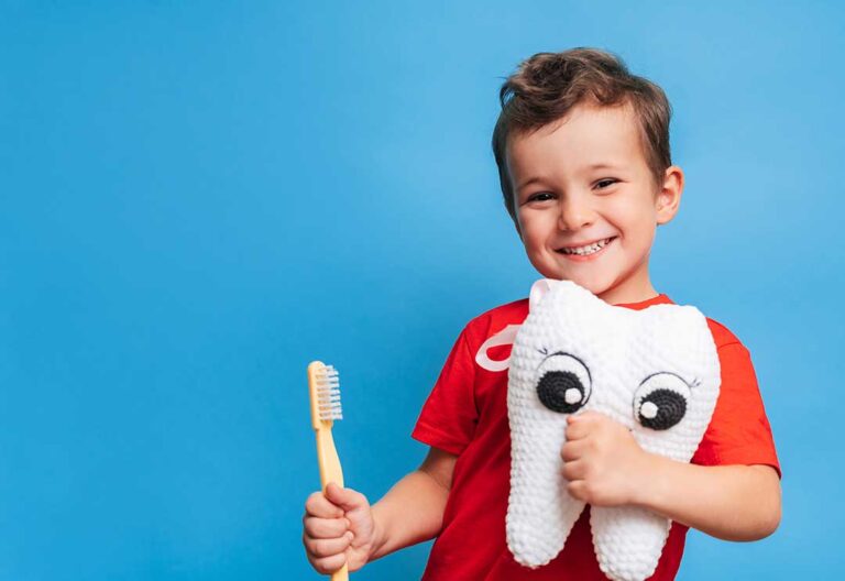 A caring adult examines a young child's mouth for signs of tooth pain or visible dental issues.